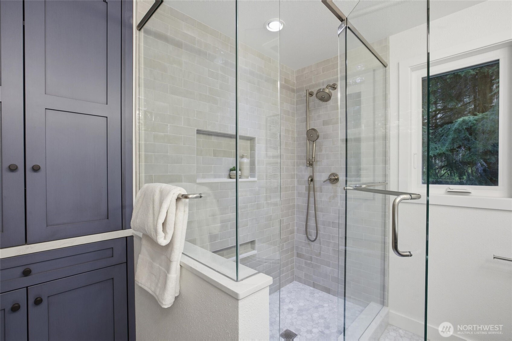 Beautiful Woodinville home with dedicated heated workshop and extra storage space in the garage