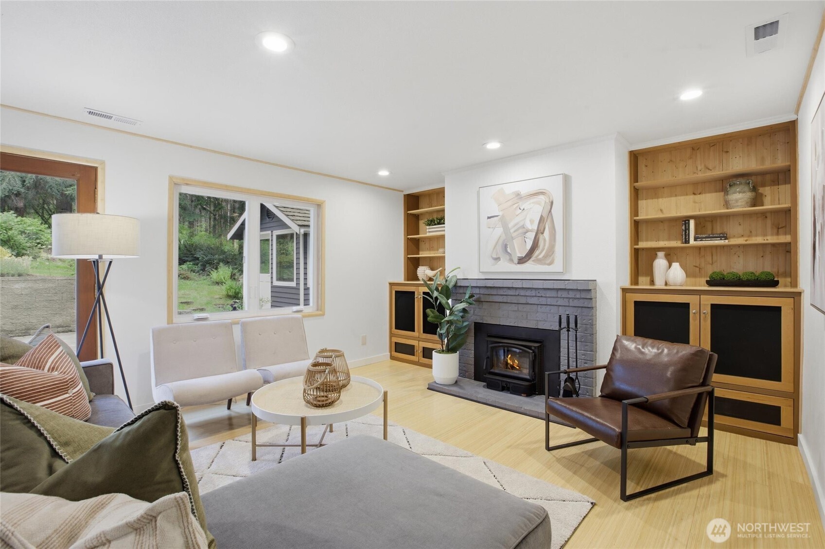 Warm and welcoming Woodinville home with cozy gas fireplace and open inviting living spaces