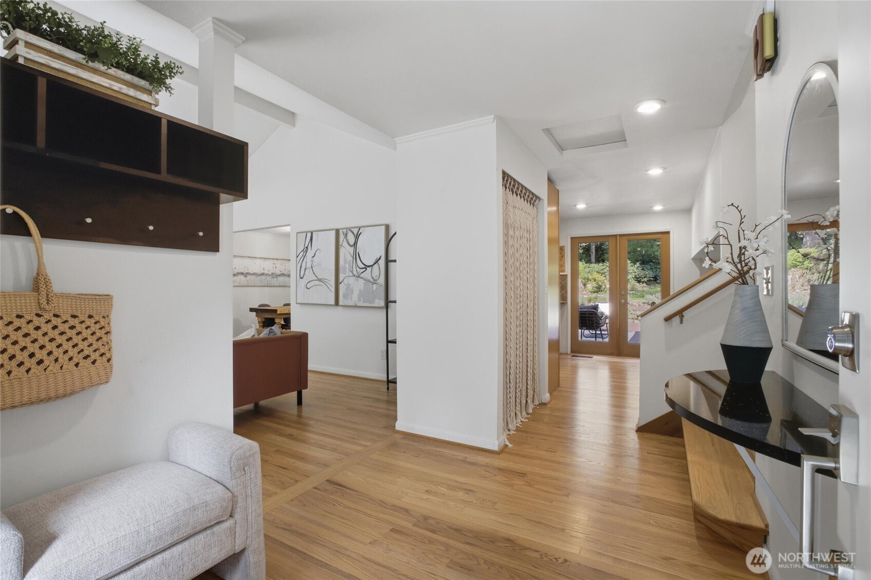 Move in ready Woodinville property with updated furnace, AC, electrical panel, and designer finishes throughout