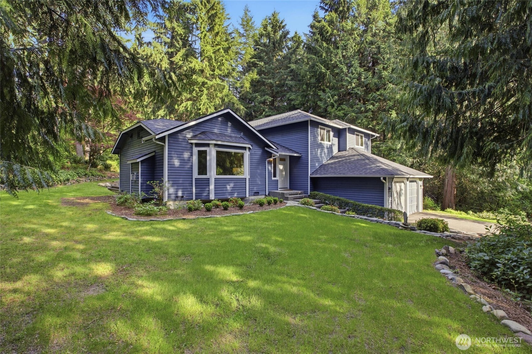 Gorgeous Woodinville property offering comfort, privacy, and modern upgrades on a spacious lot