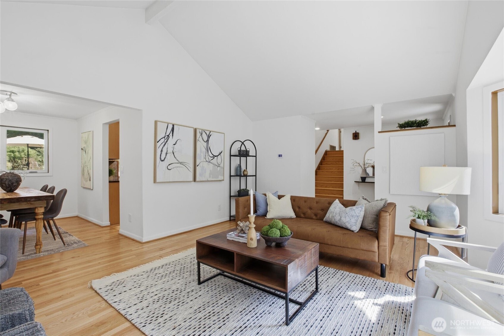 Escape to this private Woodinville home with a she shed, heated workshop, and lush outdoor living spaces