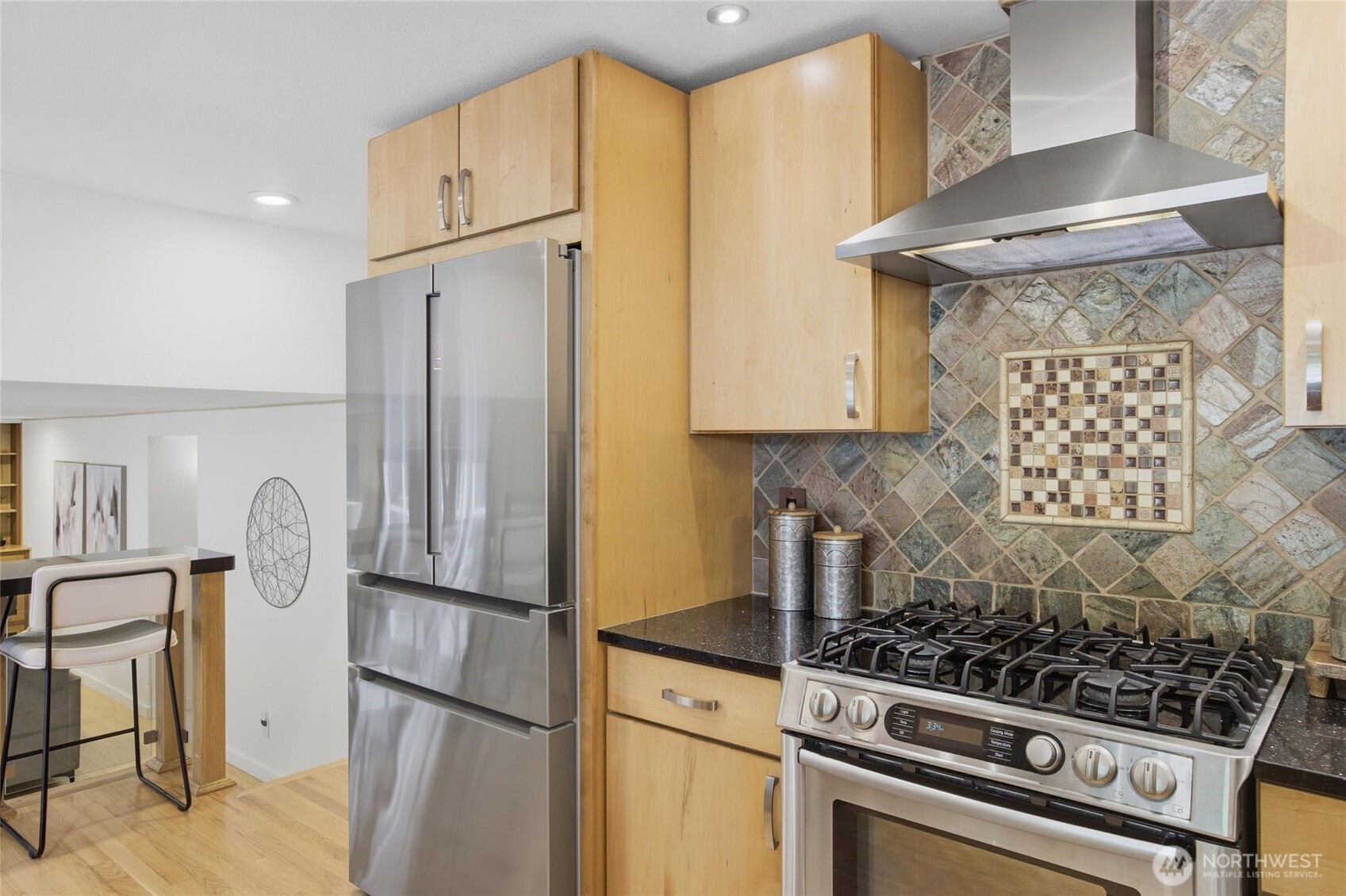 Updated farmhouse inspired kitchen with Bosch appliances, gas range, farmhouse sink, and custom finishes