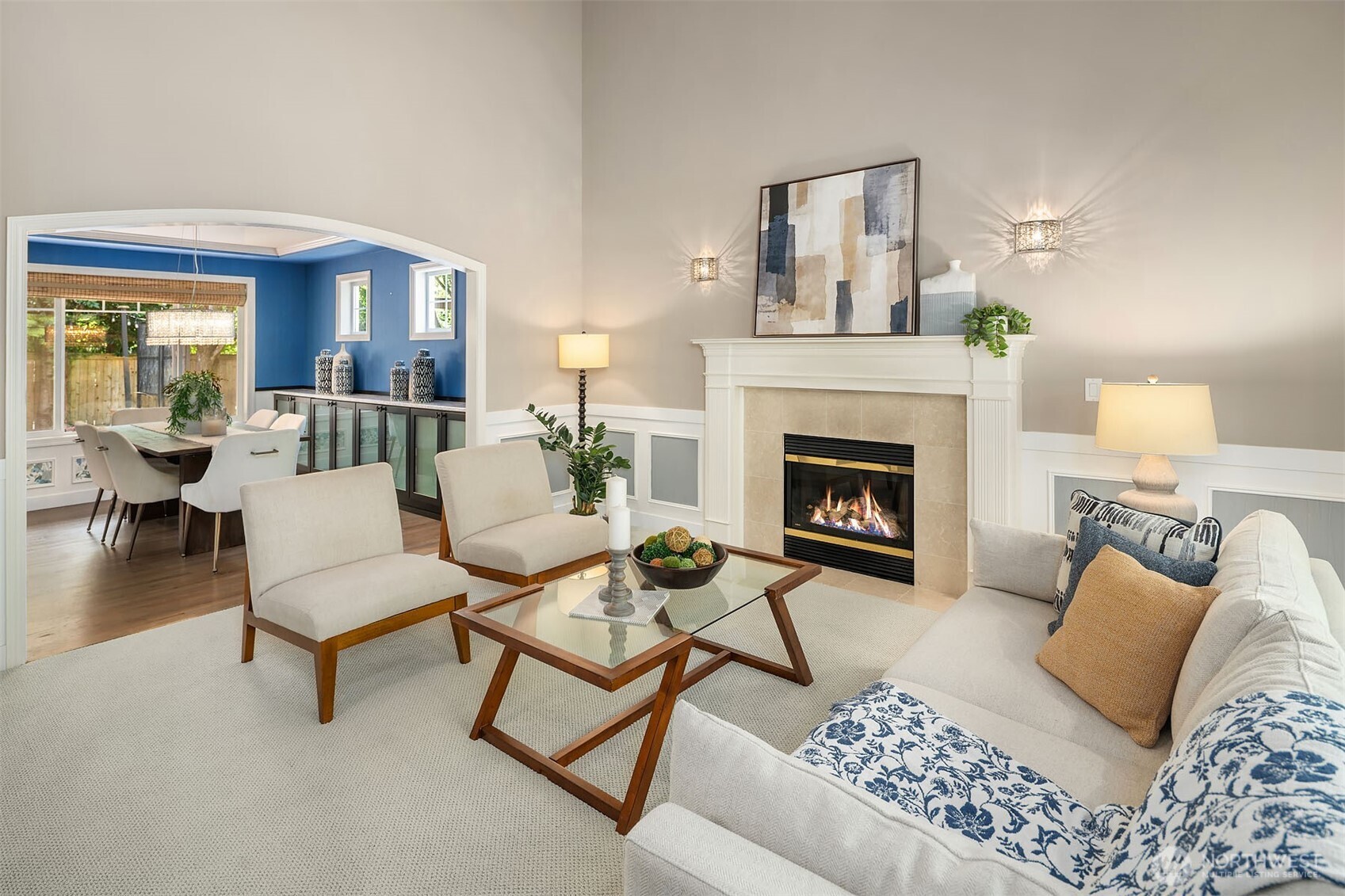 Formal living with gas fireplace.