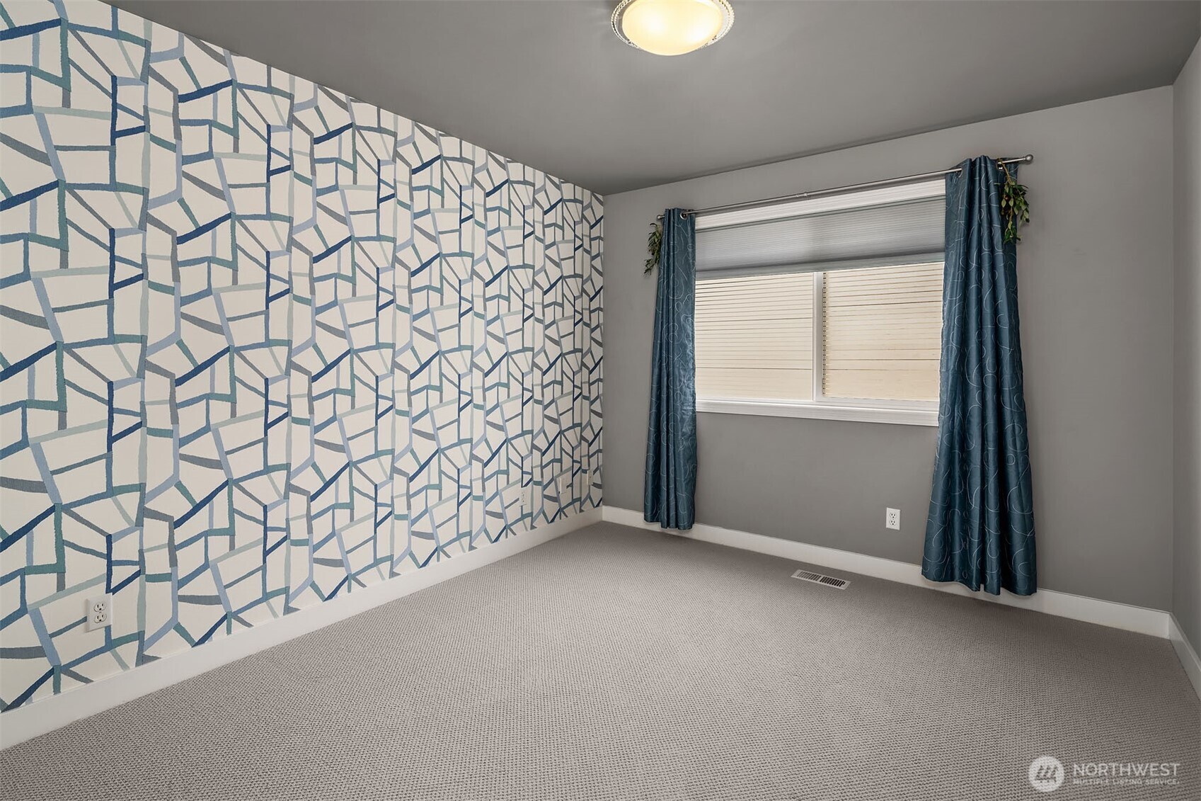 Bedroom #2 with ceiling fans.