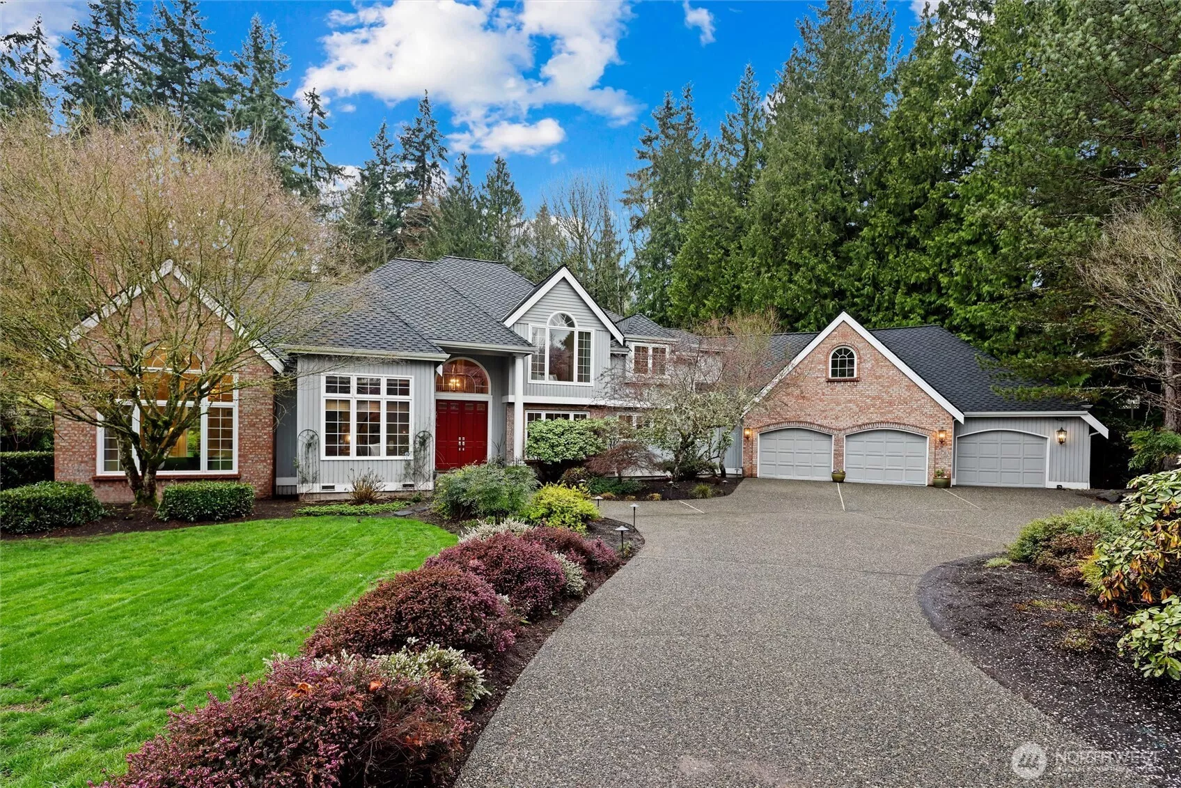 Elegant & idyllic, this 4BR, 2.5BA, 4,400 SF retreat sits in the sought-after Grousemont neighborhood, an exclusive enclave of stately homes on expansive estate-sized lots.
