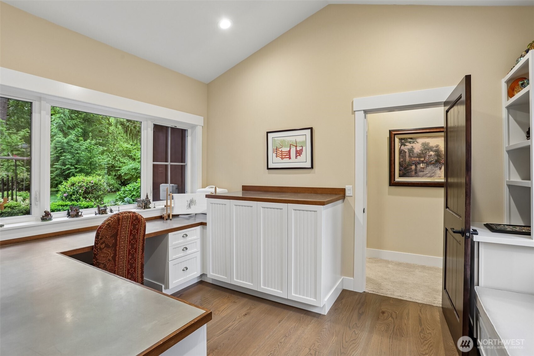 primary suite bathroom with heated ceramic tile