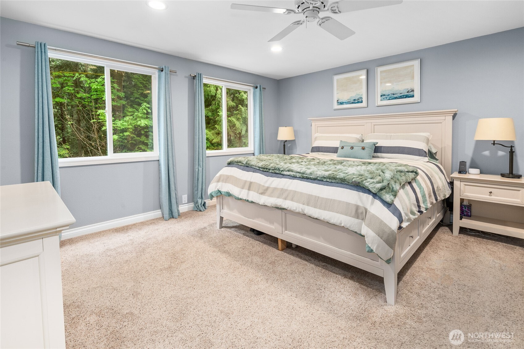 Owner Suite with huge walk-in closet, windows to backyard, en-suite bathroom with 2 sinks and large glass shower!