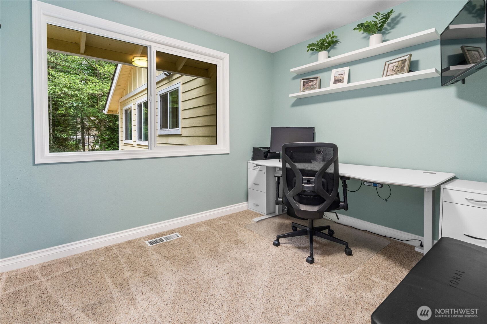Private office upstairs is set away from other 3 bedrooms and has backyard views