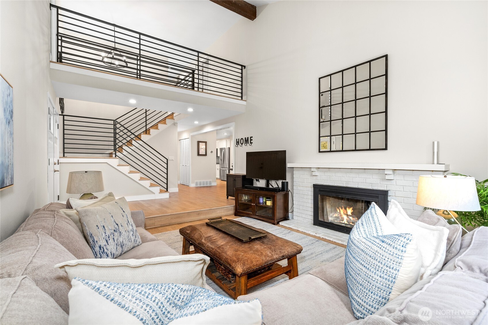 Front living room with vaulted ceilings and 2-story entry