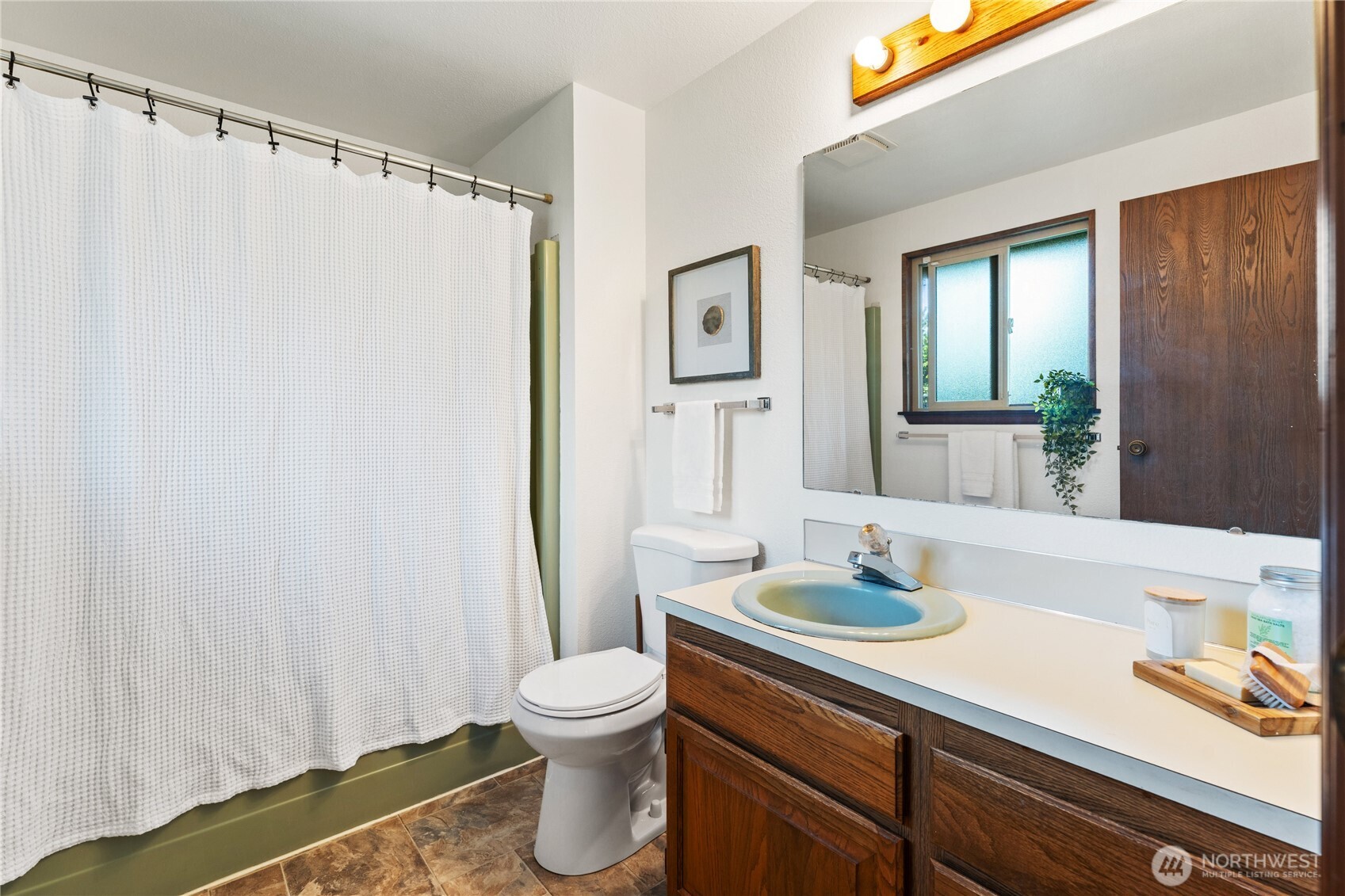 Wonderful full private primary bedroom.