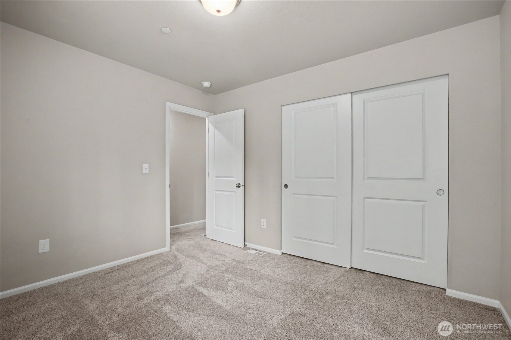 bedroom #3 with reach-in closet