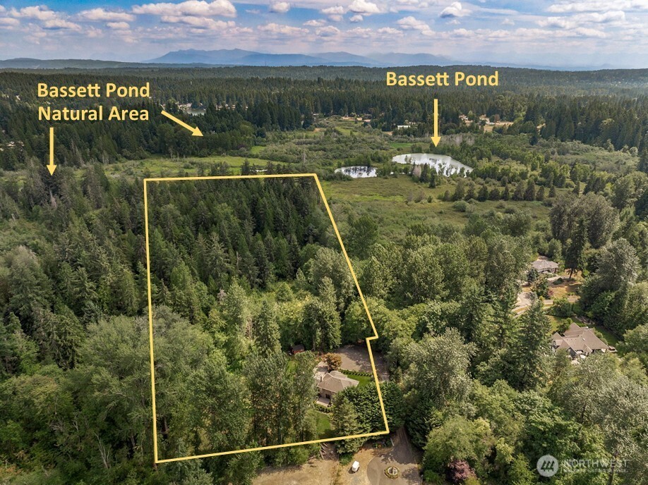 This property is adjacent to Bassett Pond Natural Area. This hidden gem, nestled in the Sammamish River Valley, provides a sanctuary for wildlife and a tranquil spot for nature enthusiasts to explore. Approximate Lot Lines.