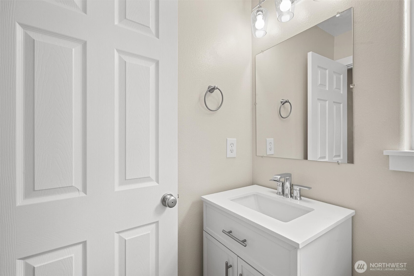 The 1/2 bath complements the main floor.