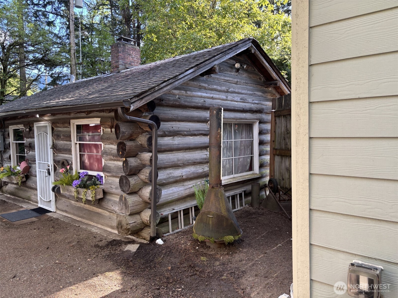 There is also special surprise you will find; an original log cabin accessed off alley that was built in 1948. This unit is referred to as: #541-1/2, is 440 SF of living with big custom built masonry fireplace.