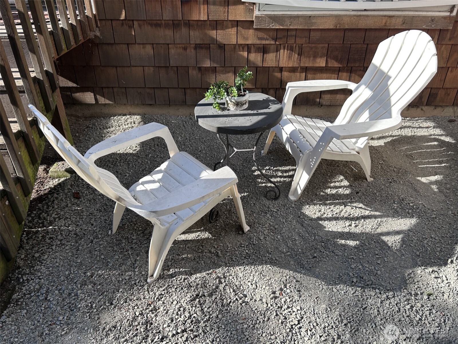 It offers a small sunny sitting area to use for quiet relaxation.