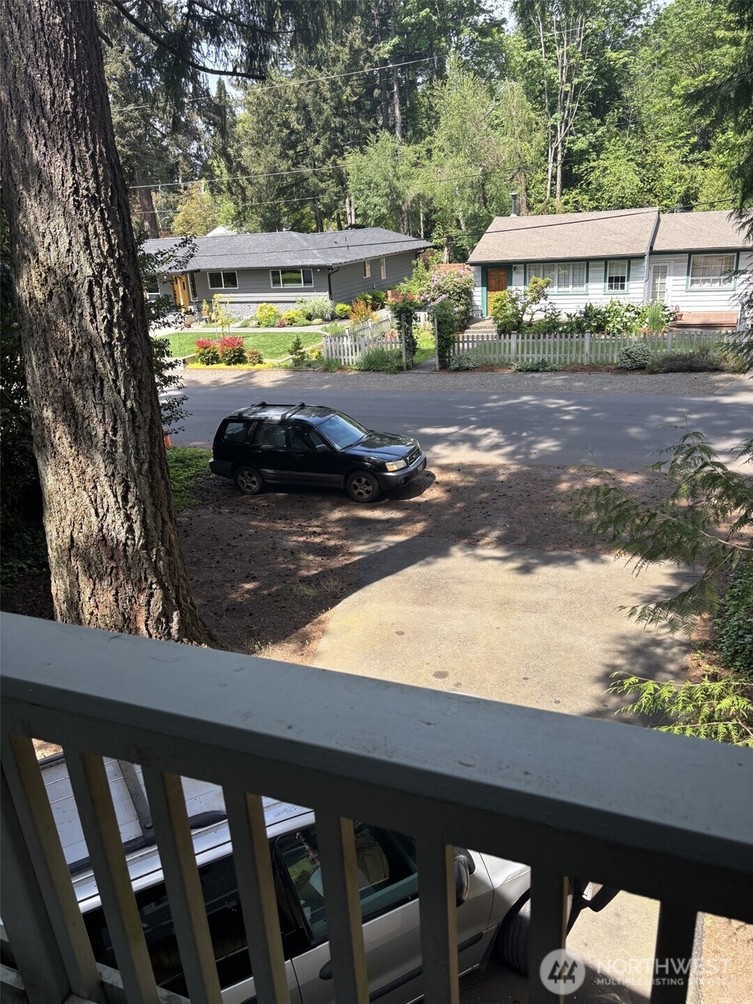 This view looking off front deck from the upper floor ADU living & kitchen. Overlooking  NE Alder St. which is frequently cited as a quiet location; this neighborhood is considered to be 'The HEART' of Historic Downtown Issaquah!