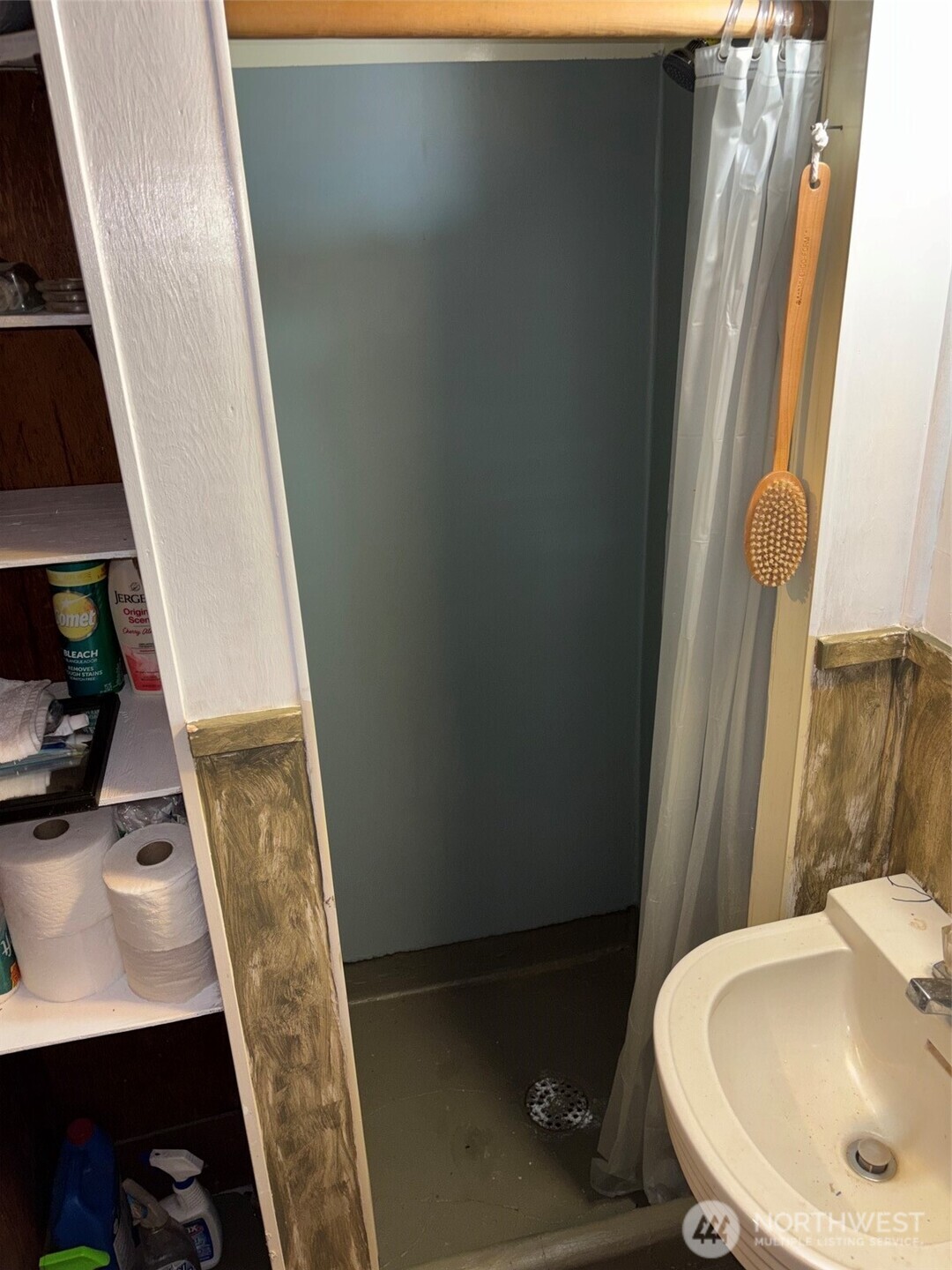 Shower with linen closet