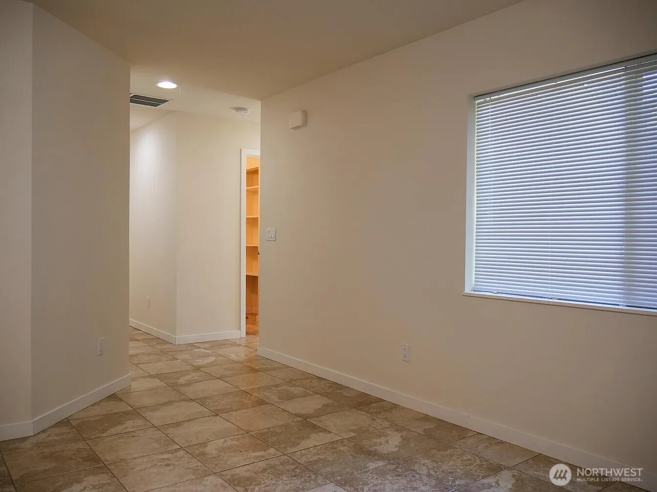 Exiting great room to go see the 3 BRs, utility and bath.
