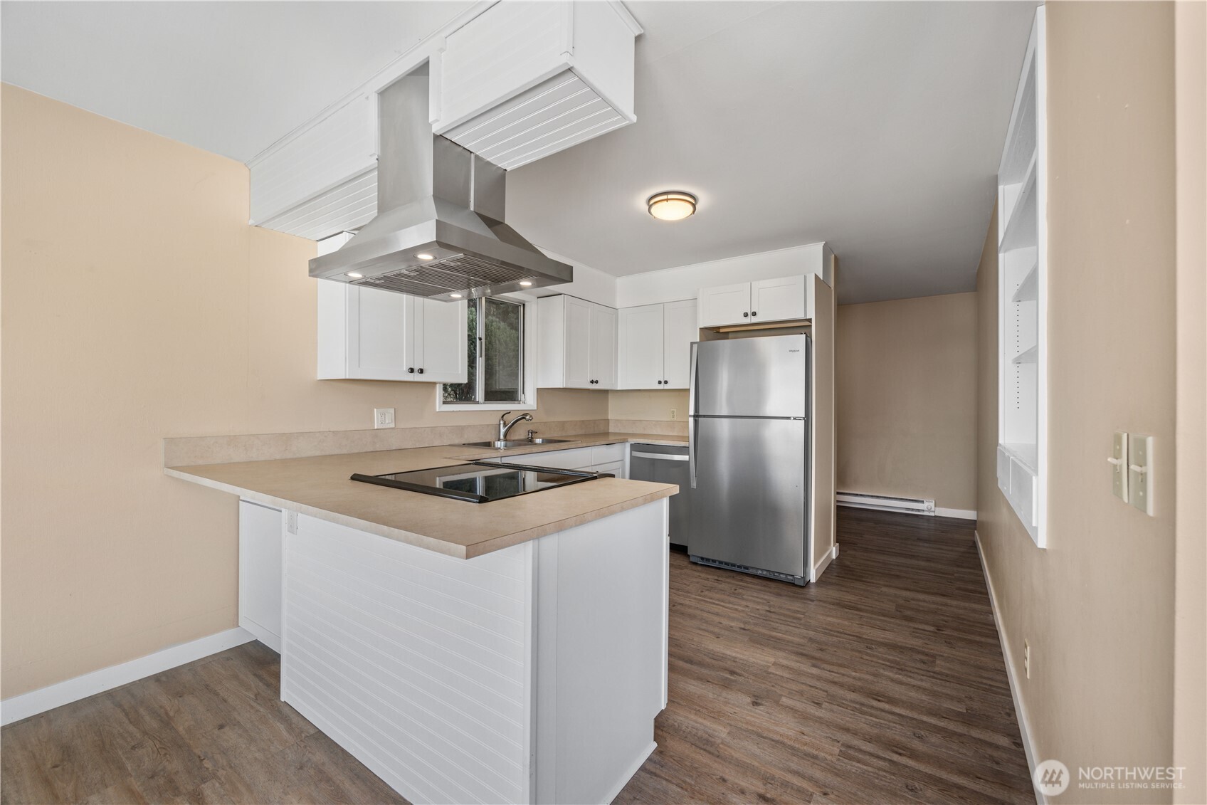View 1 of main level kitchen.