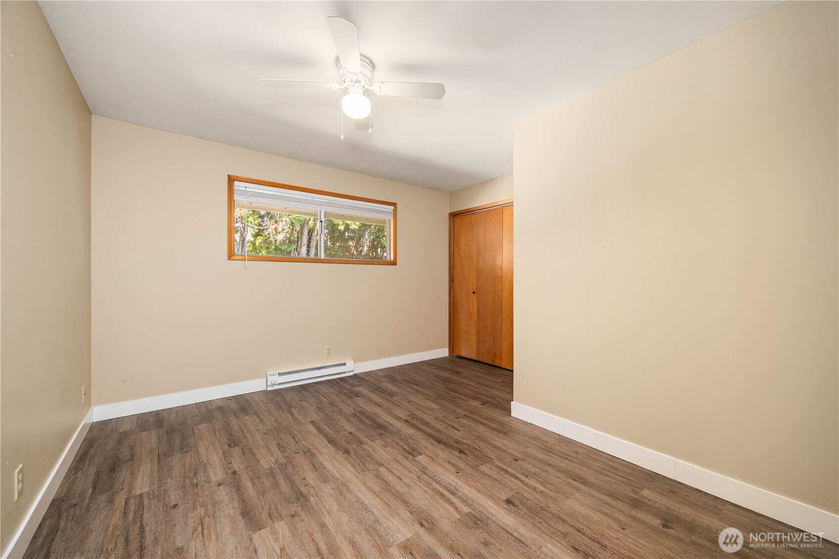 View of main level hallway and utility room.