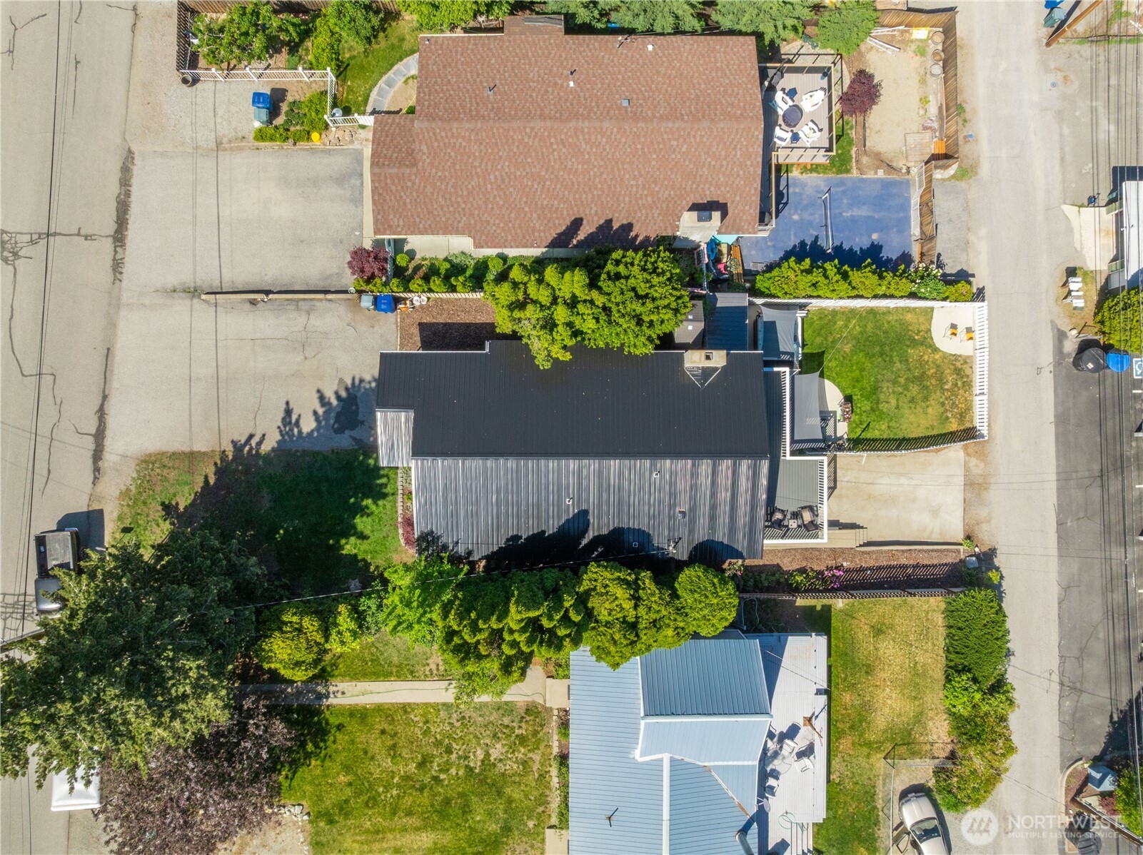 Overhead view of home and lot.