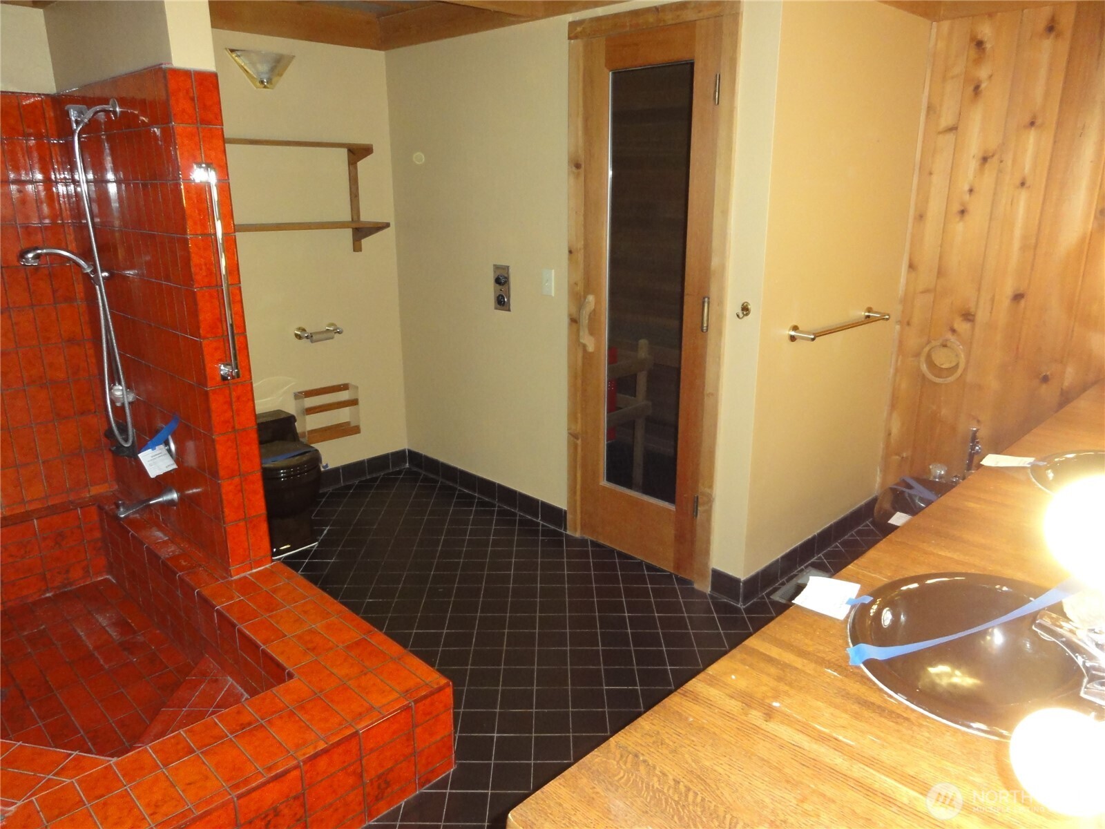 Primary bathroom offers huge tub/shower, sauna and a bidet.
