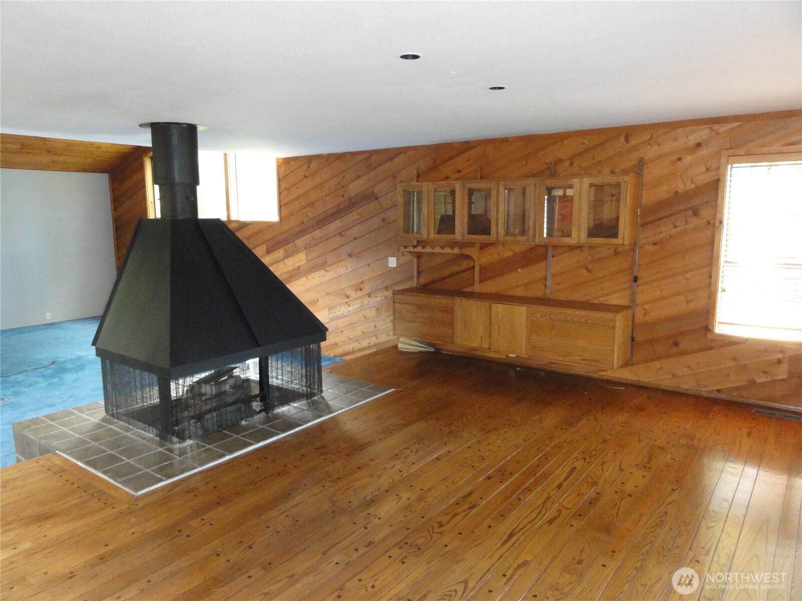 Fromal dining room with see thru fireplace to the formal living room.