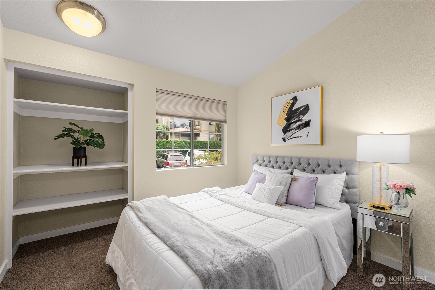 Second bedroom with natural light and ample closet space