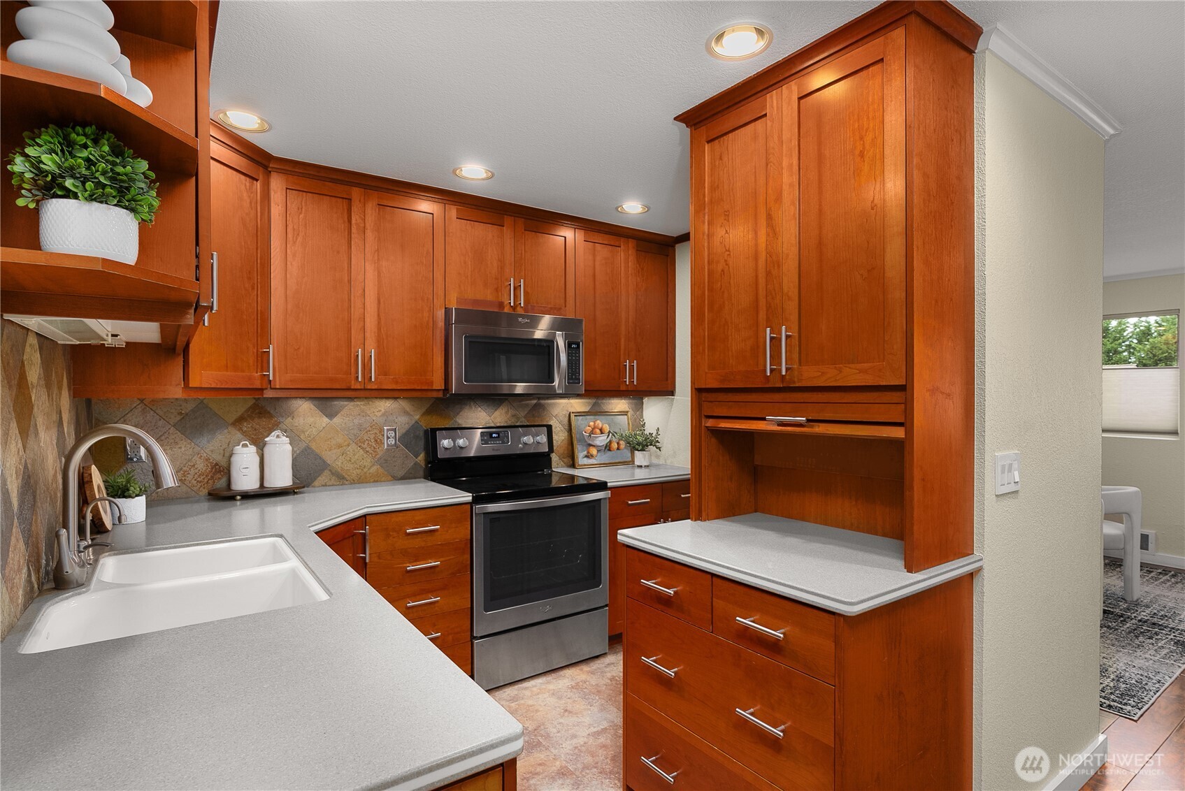 Main-level powder room for guests, with a conveniently located laundry closet on the opposite side (not shown in photos)