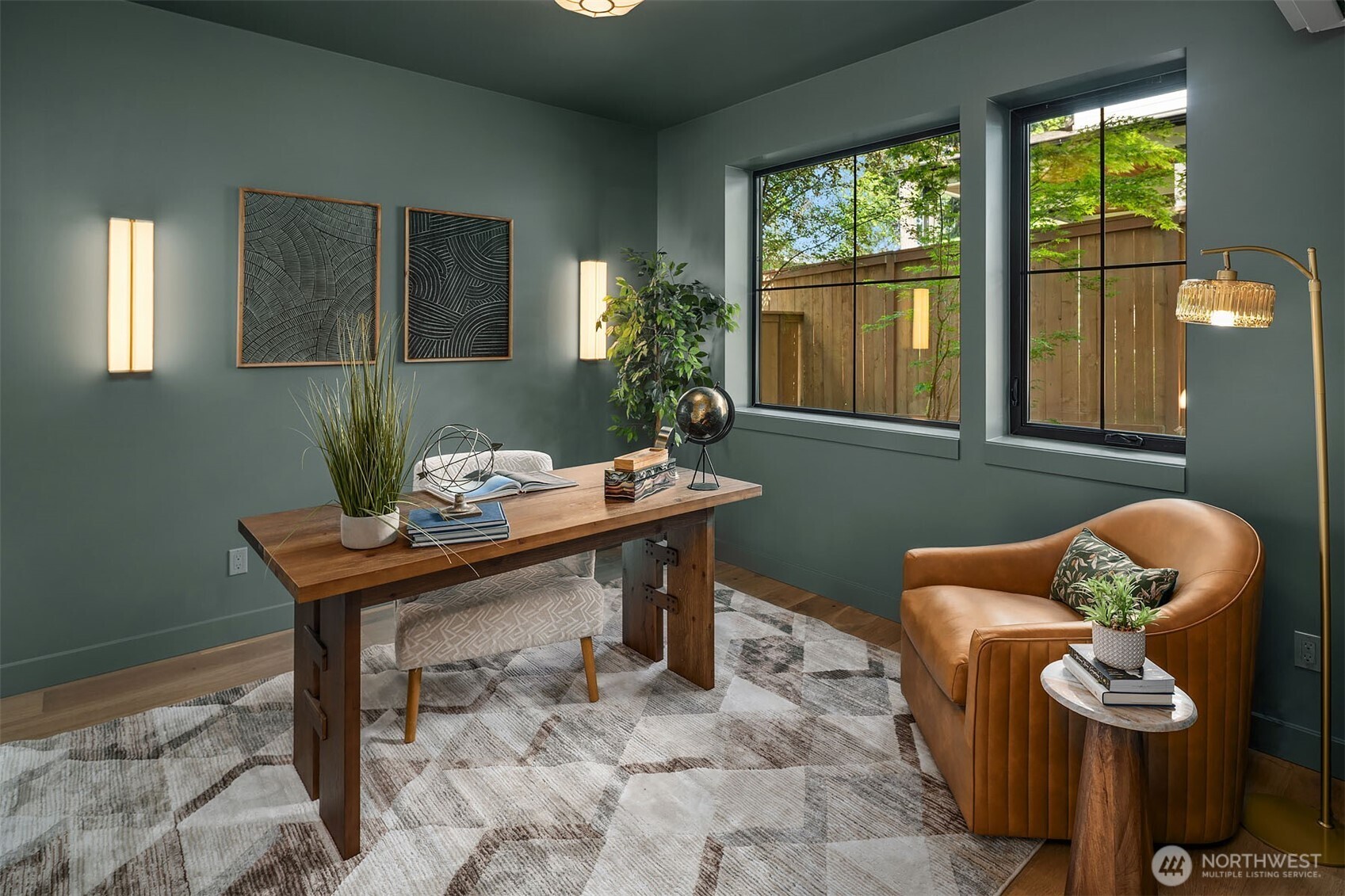 Main floor office/den is also a bedroom with access to a convenient bathroom