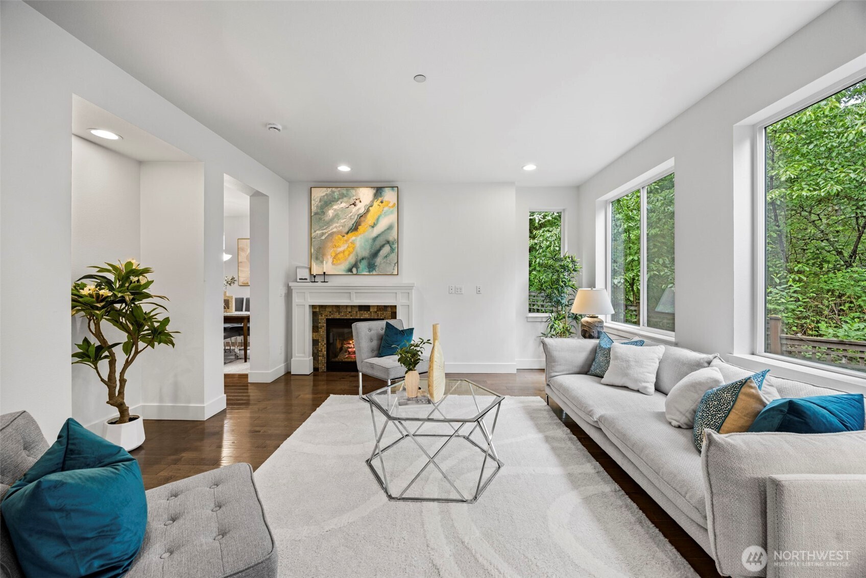 Living room also has multiple windows with full privacy as there is no home behind