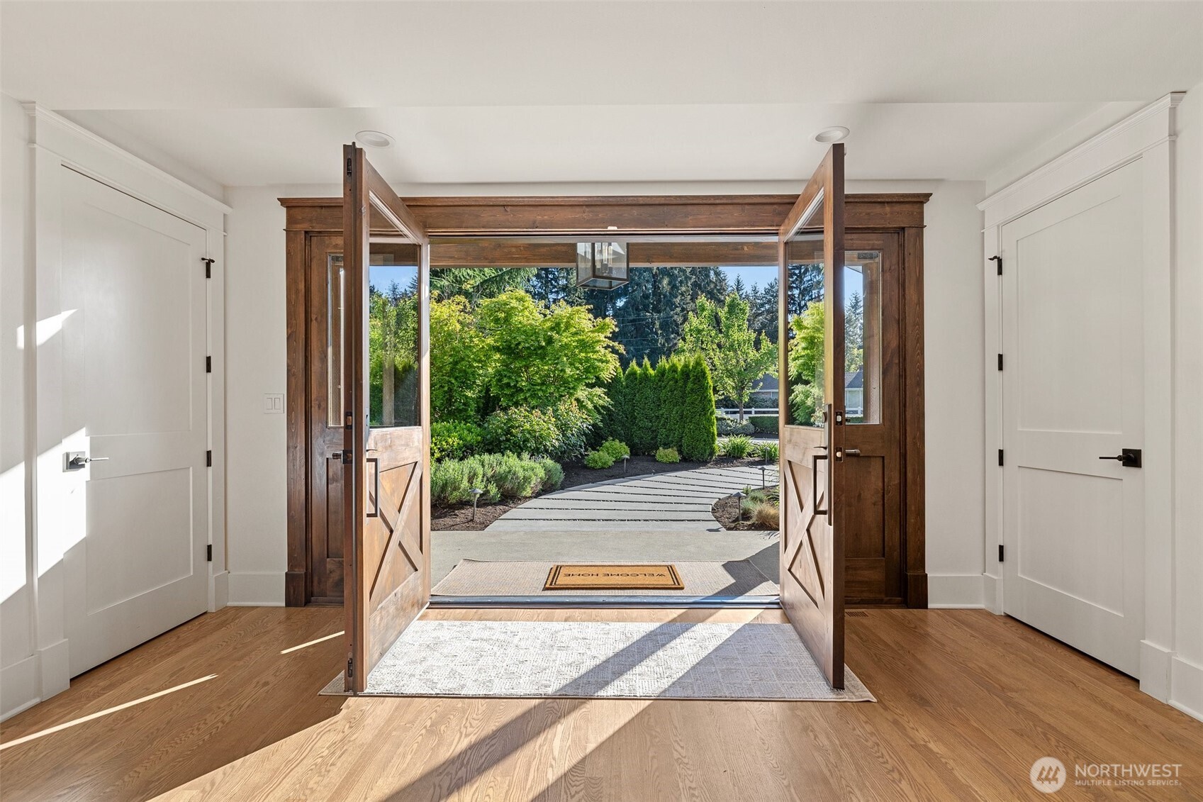 Dual Hallway Closets off Elegant Entryway.