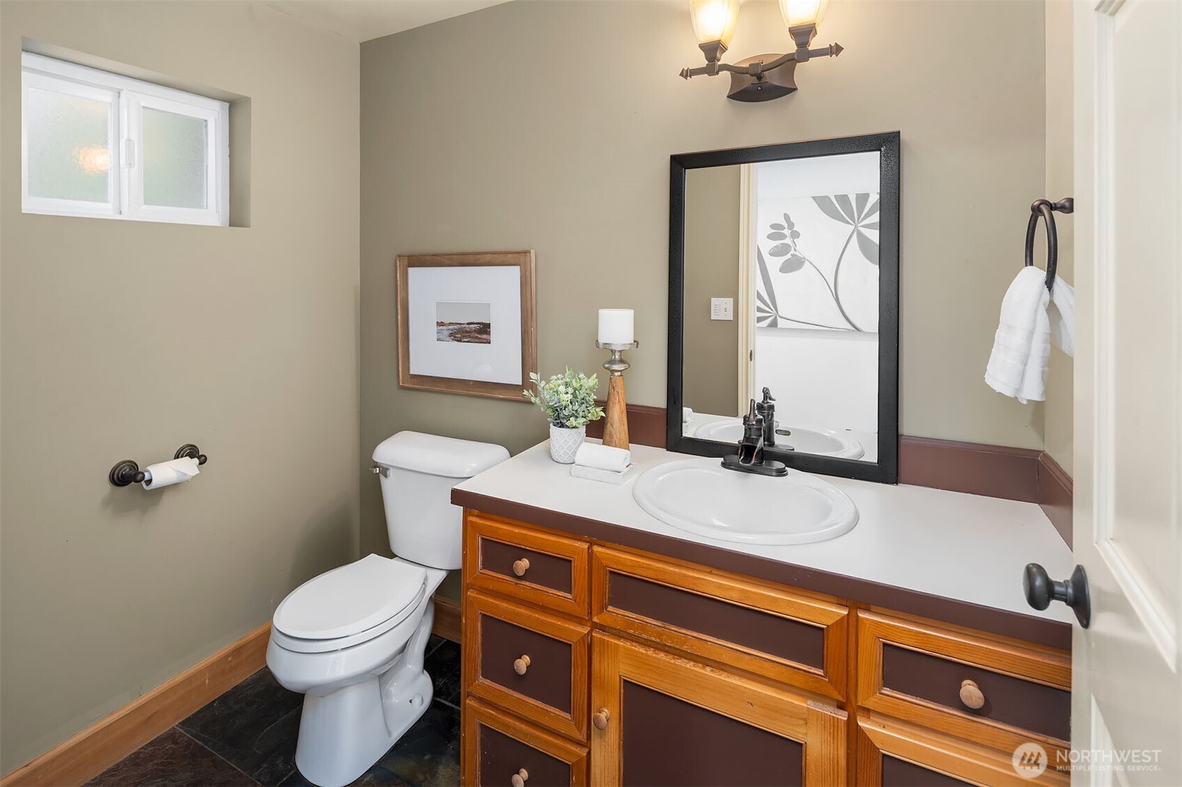 1/2 Bath in the flex space which could be converted into a separate living space