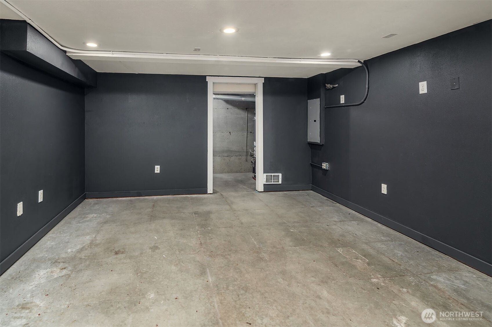 Garage space with storage that was converted into an Office.  Could easily be converted back into a garage