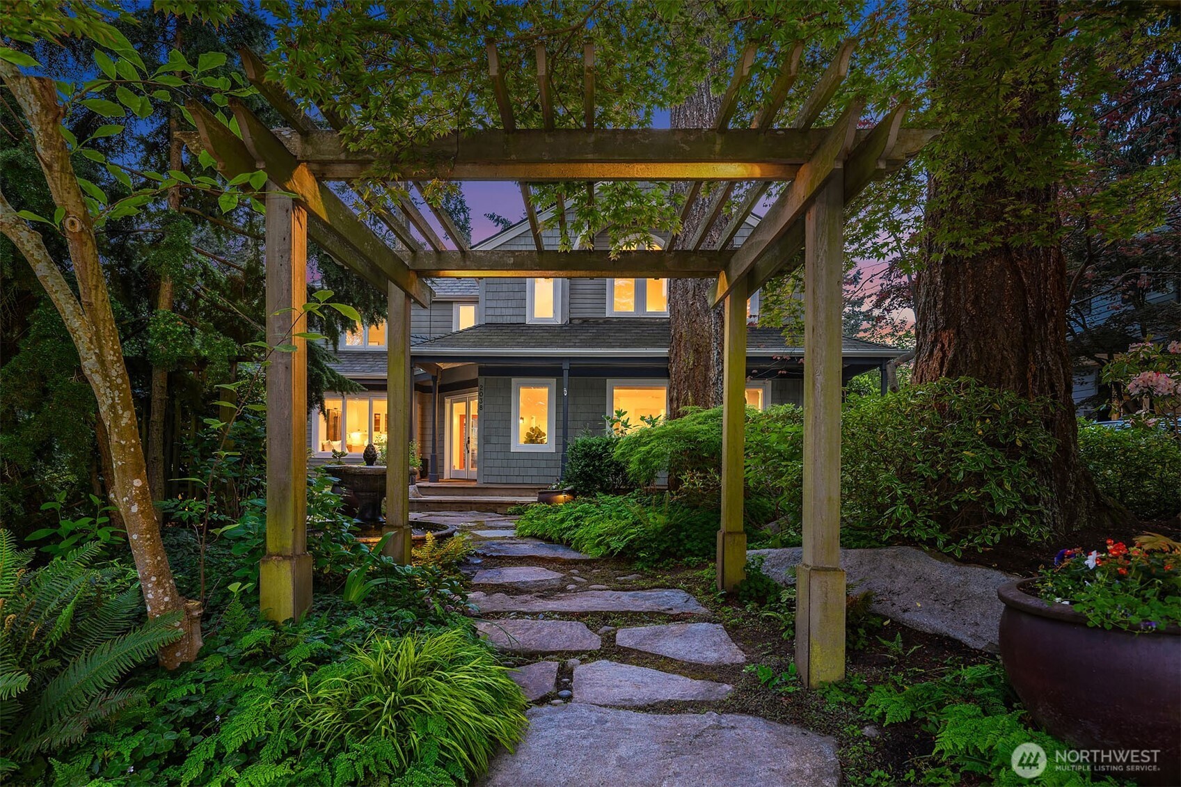 Entry arbor greets you as you enter the peaceful and private gardens