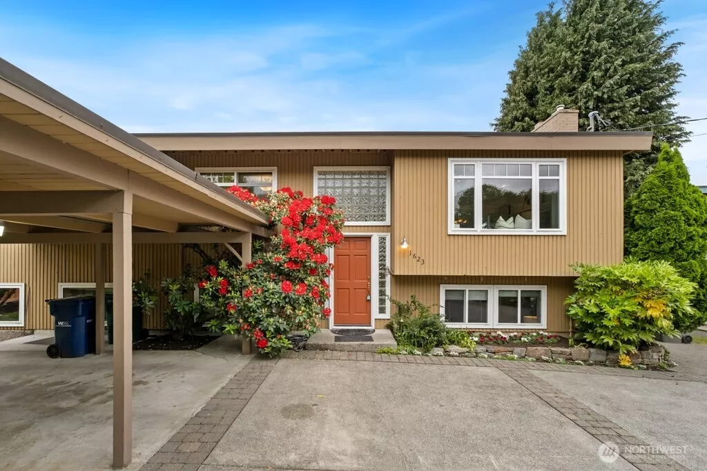 Custom split-level home with breathtaking mountain and peek-a-boo lake views