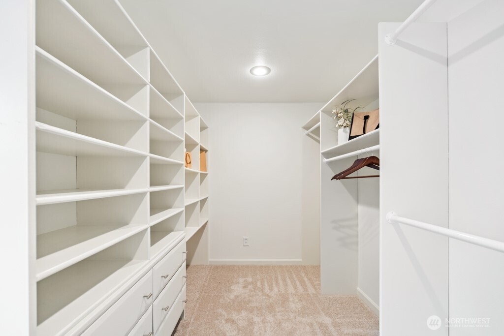 Primary walk-in closet, custom closet organizers
