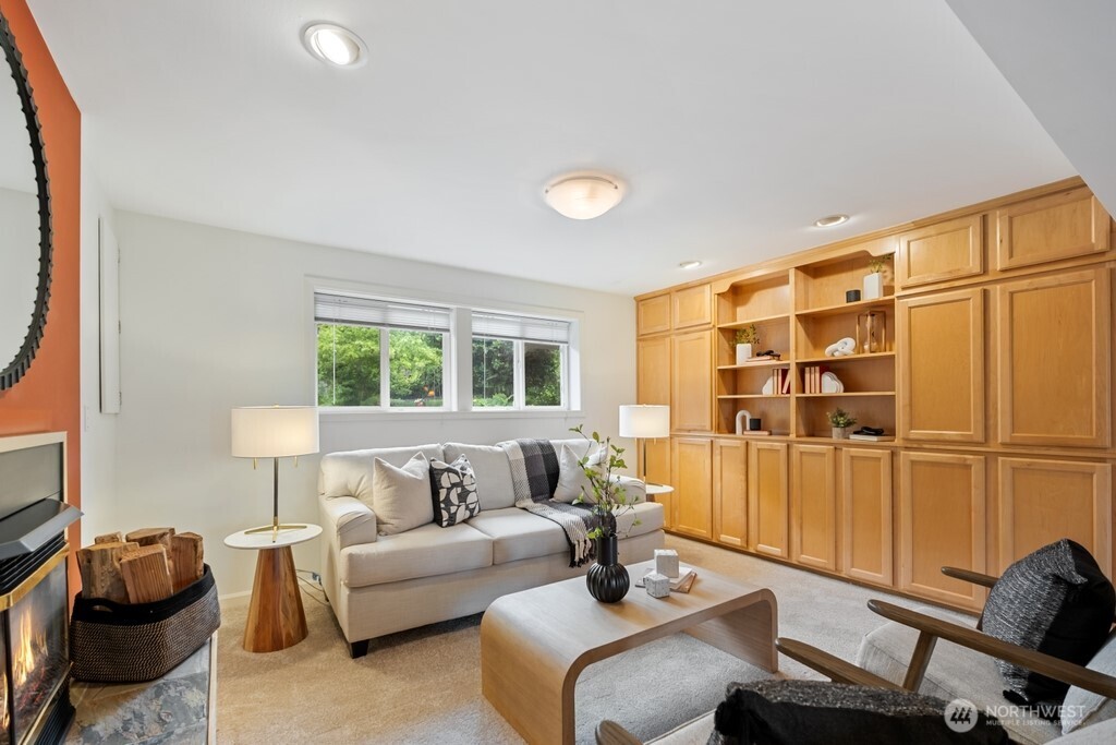 Spacious lower level family room with gas fireplace