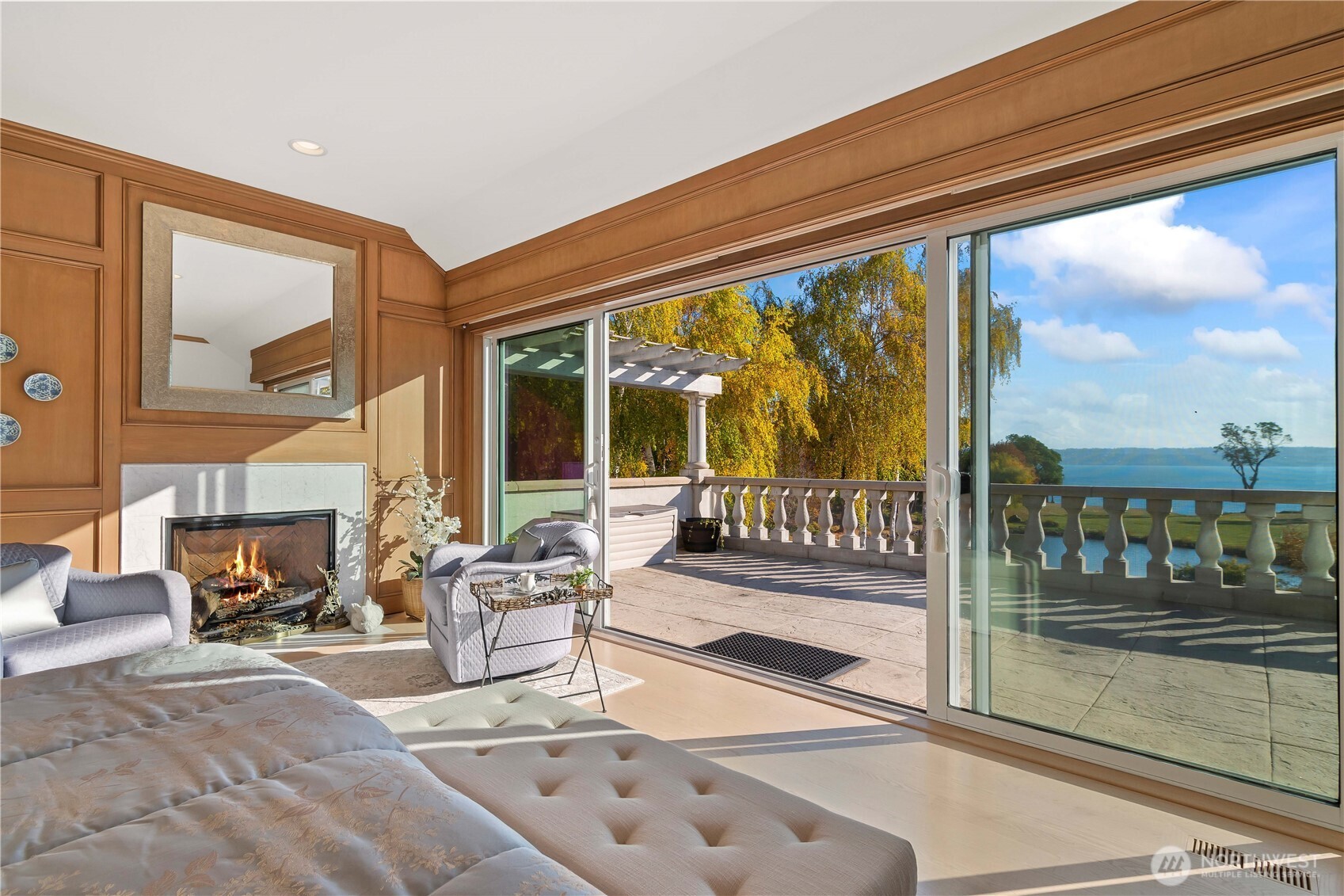 Primary bedroom with veranda and mountain/sound views