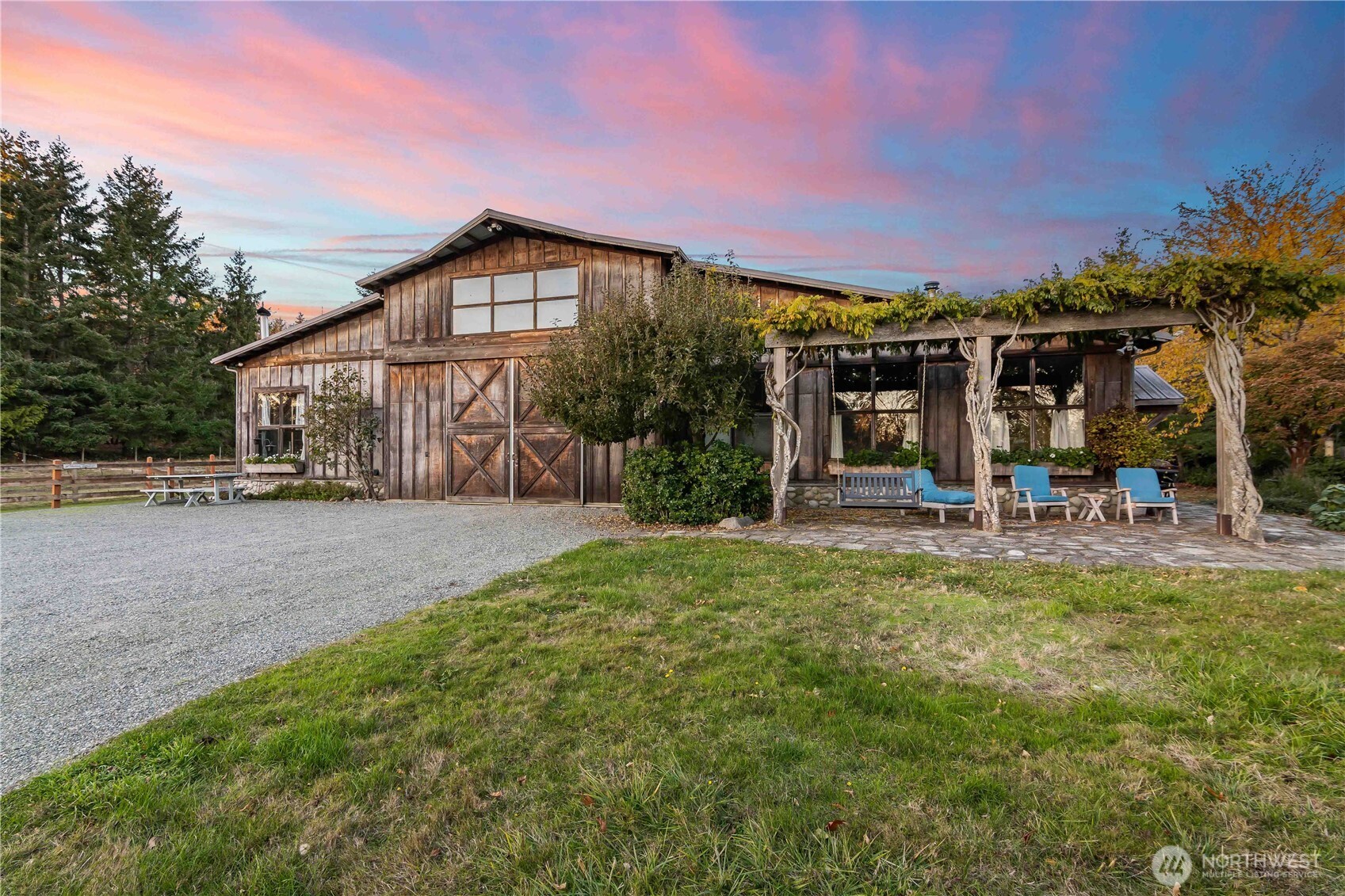 5000 square foot barn includes walk in stalls, elevated hay storage, tack room.