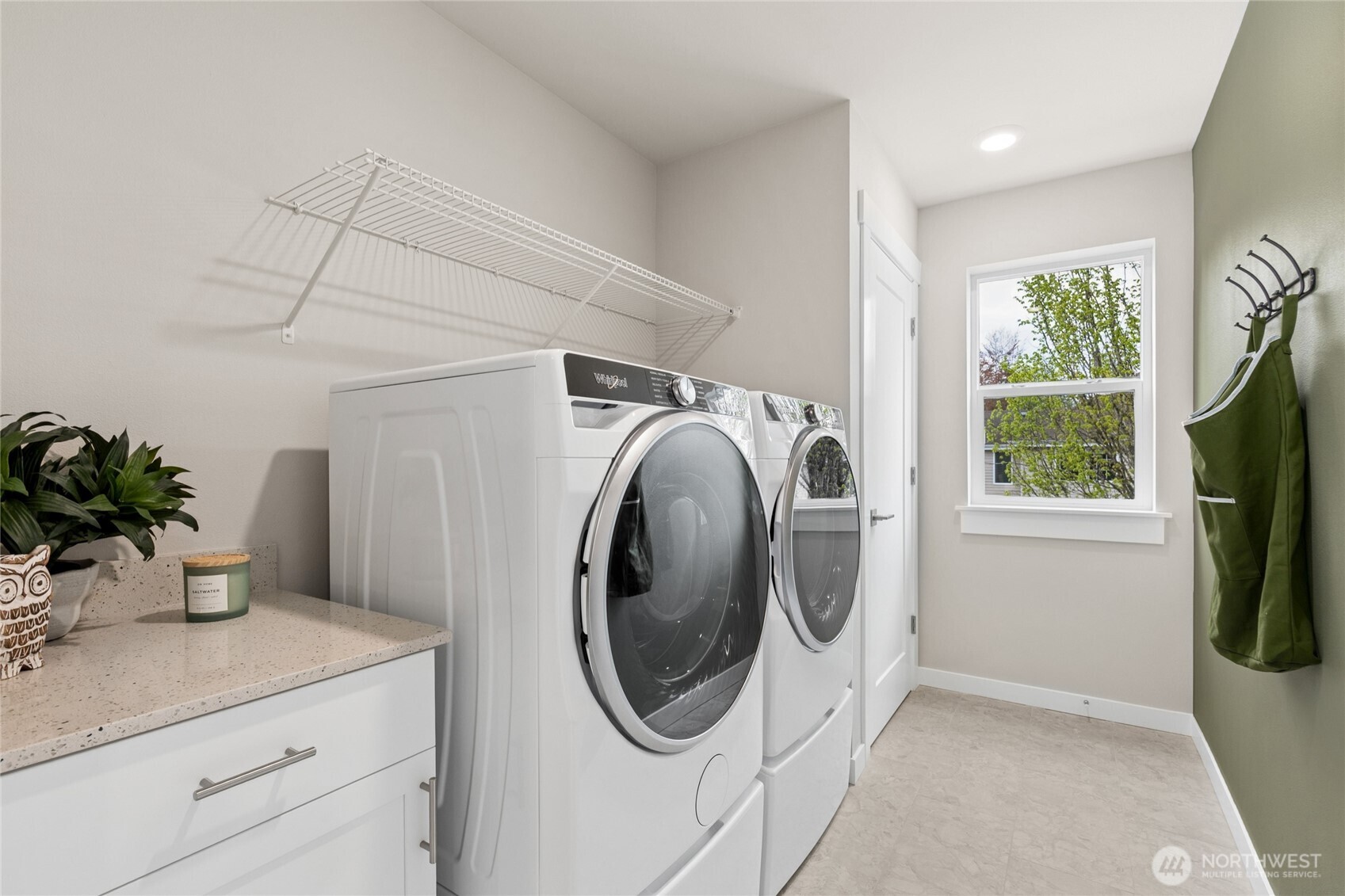 Laundry with folding areas per plan