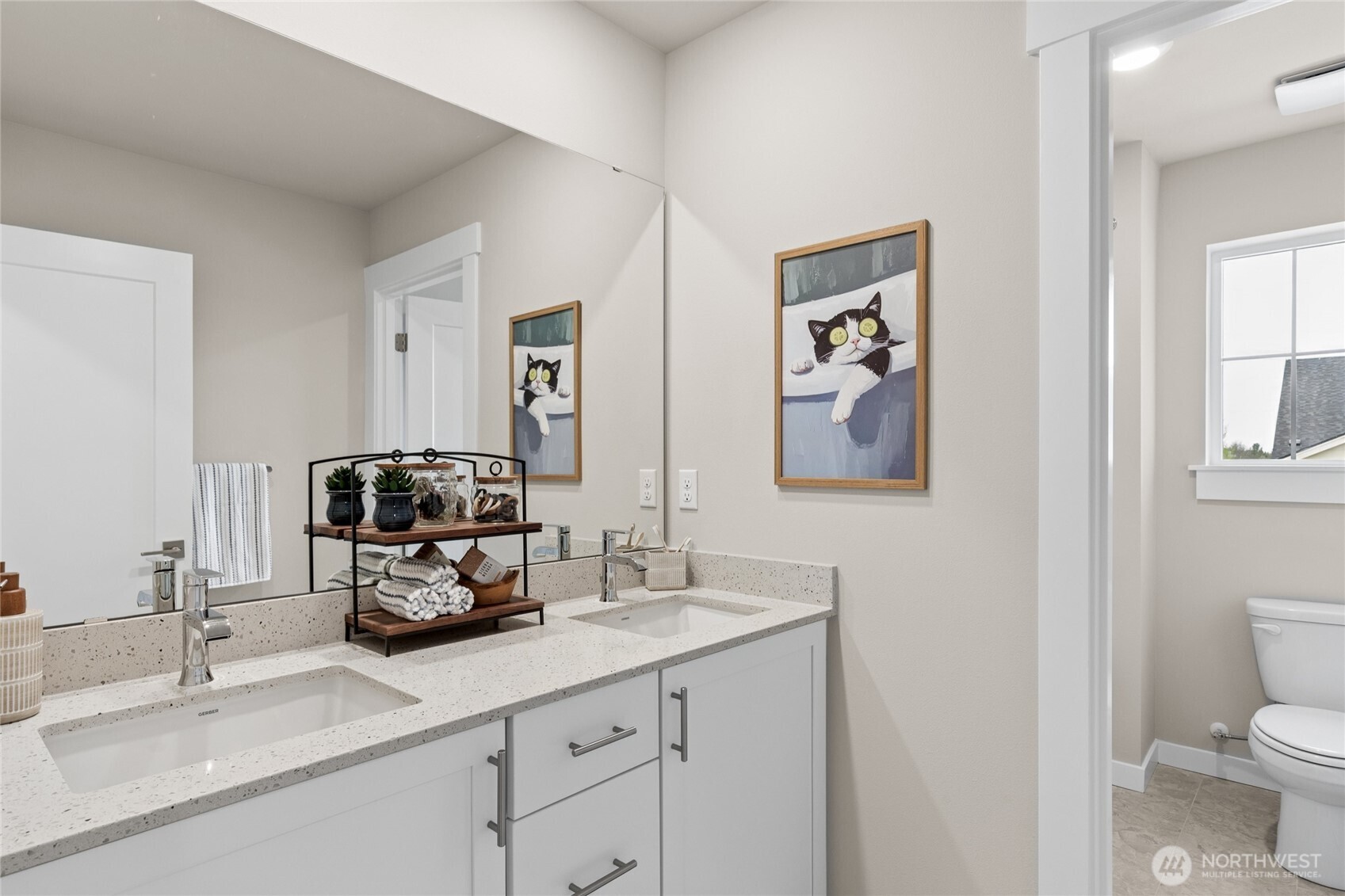 Second floor guest bath with tub/shower combo and quartz counters