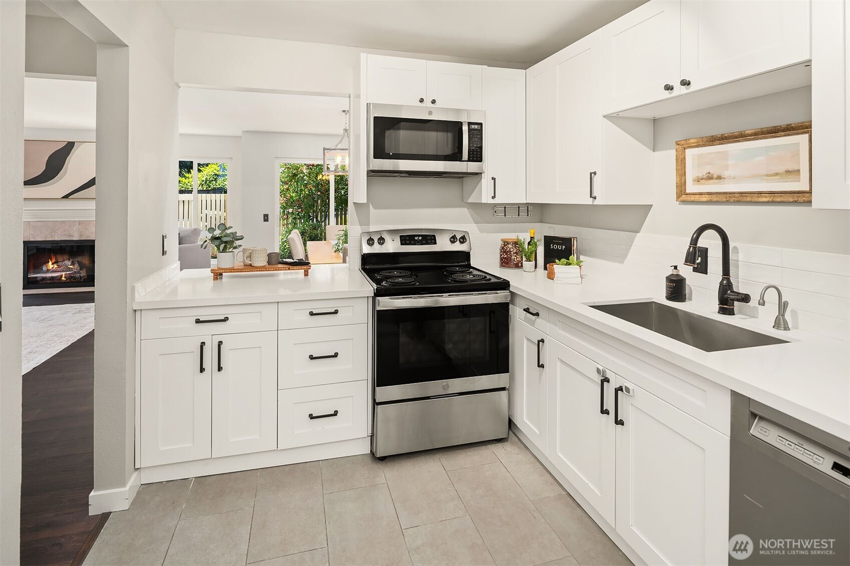 New kitchen cabinets, quartz counters, stainless steel appliances, and paint!
