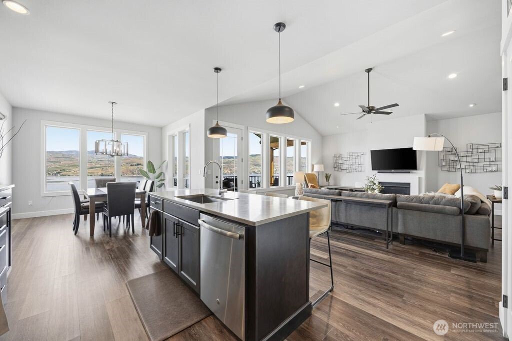 This floorplan was thoughtfully designed for efficiency and function. The French door to the view deck enhances the flow for entertaining while preserving valuable wall space and maintaining sightlines throughout the great room.