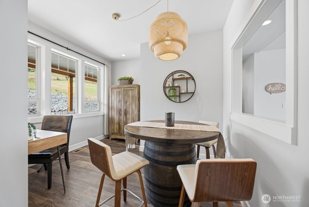 Just off the entry, this open-air space offers flexibility for a multitude of purposes. Game room, wine room, home office, parlor/library.