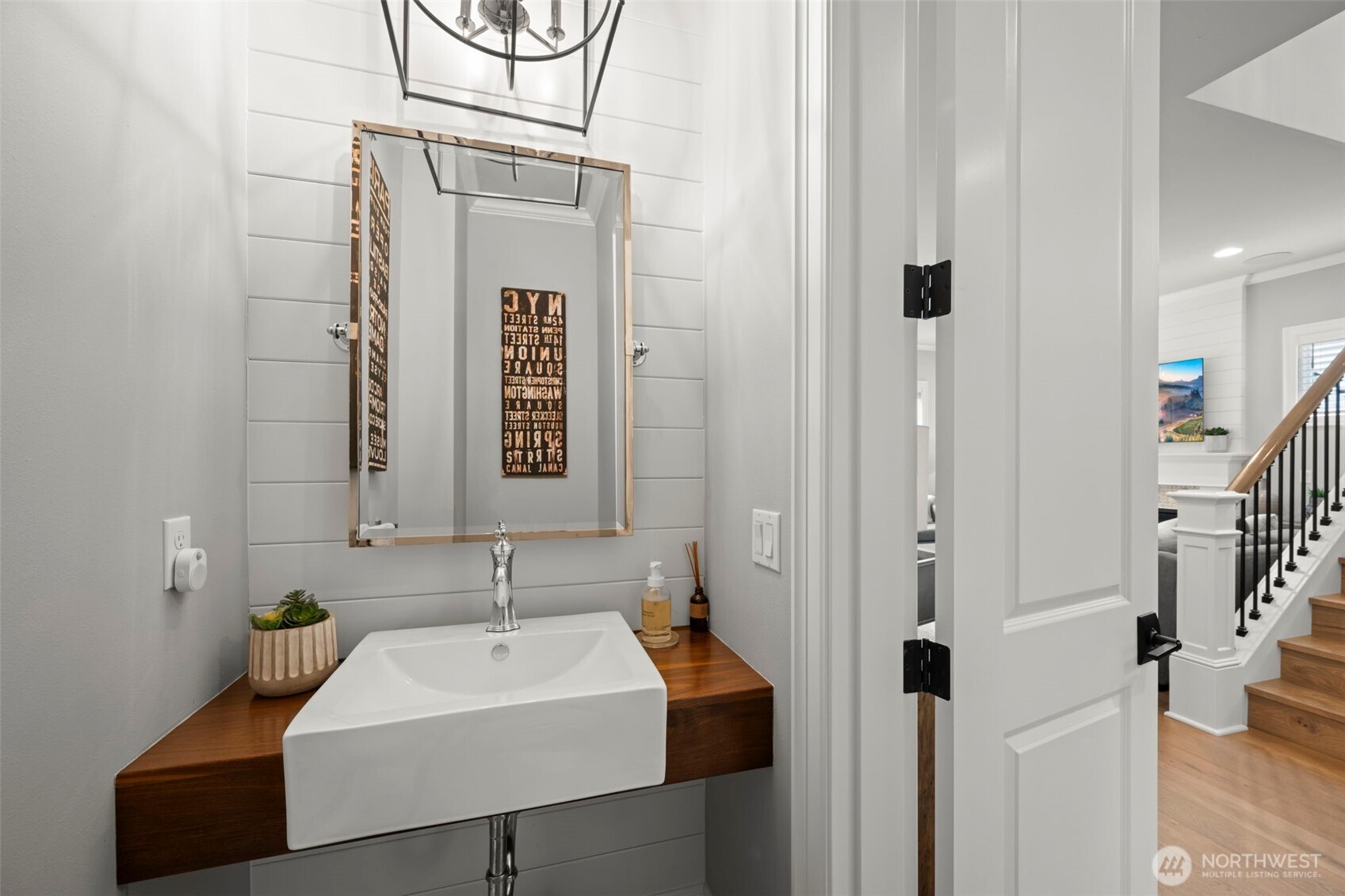 Powder room with custom chandelier