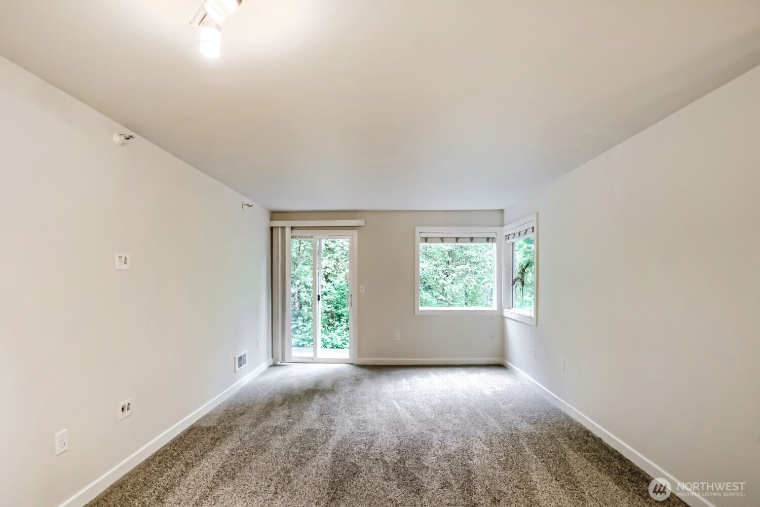 Living Room w/ Wood Burning Fireplace