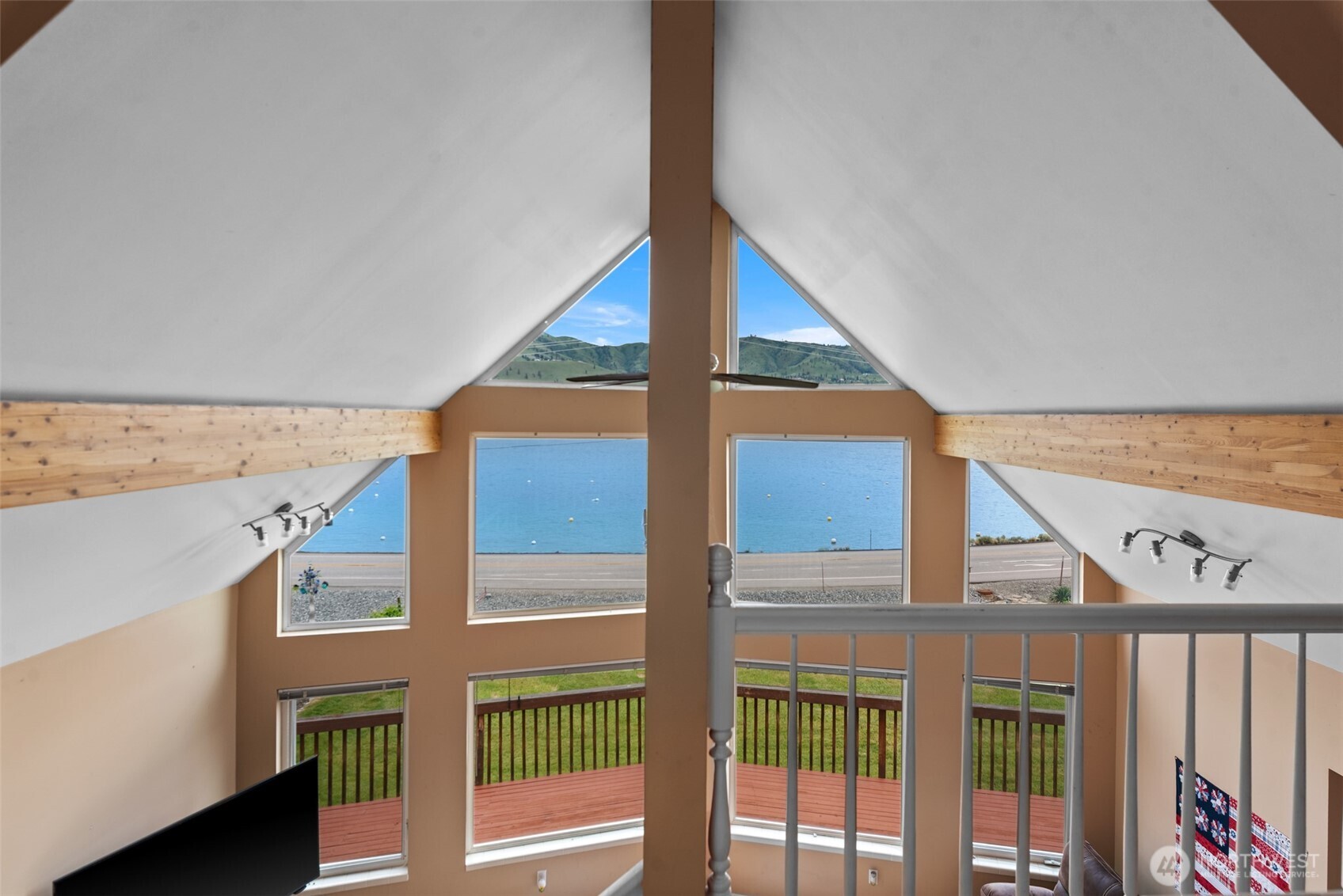 Nothing but beautiful views from this floor to ceiling window wall!