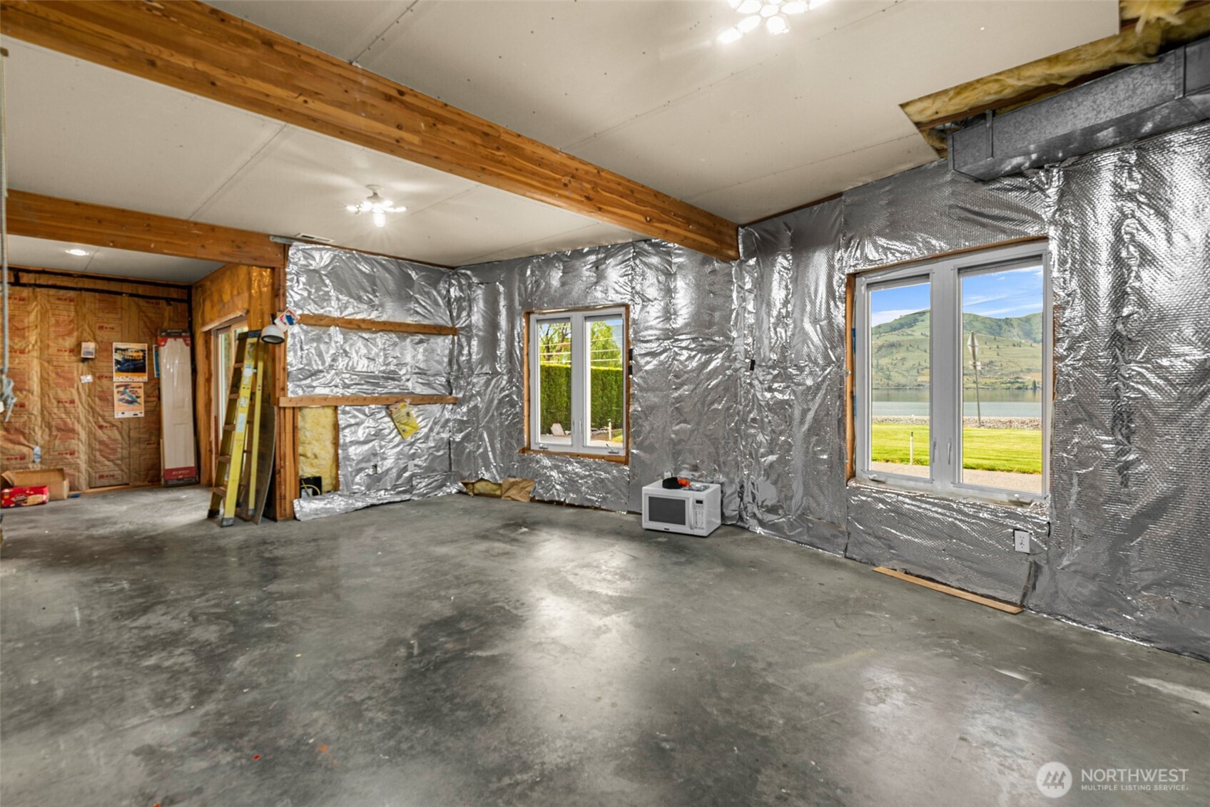 The lower level is unfinished and just waiting to be completed to meet your needs.