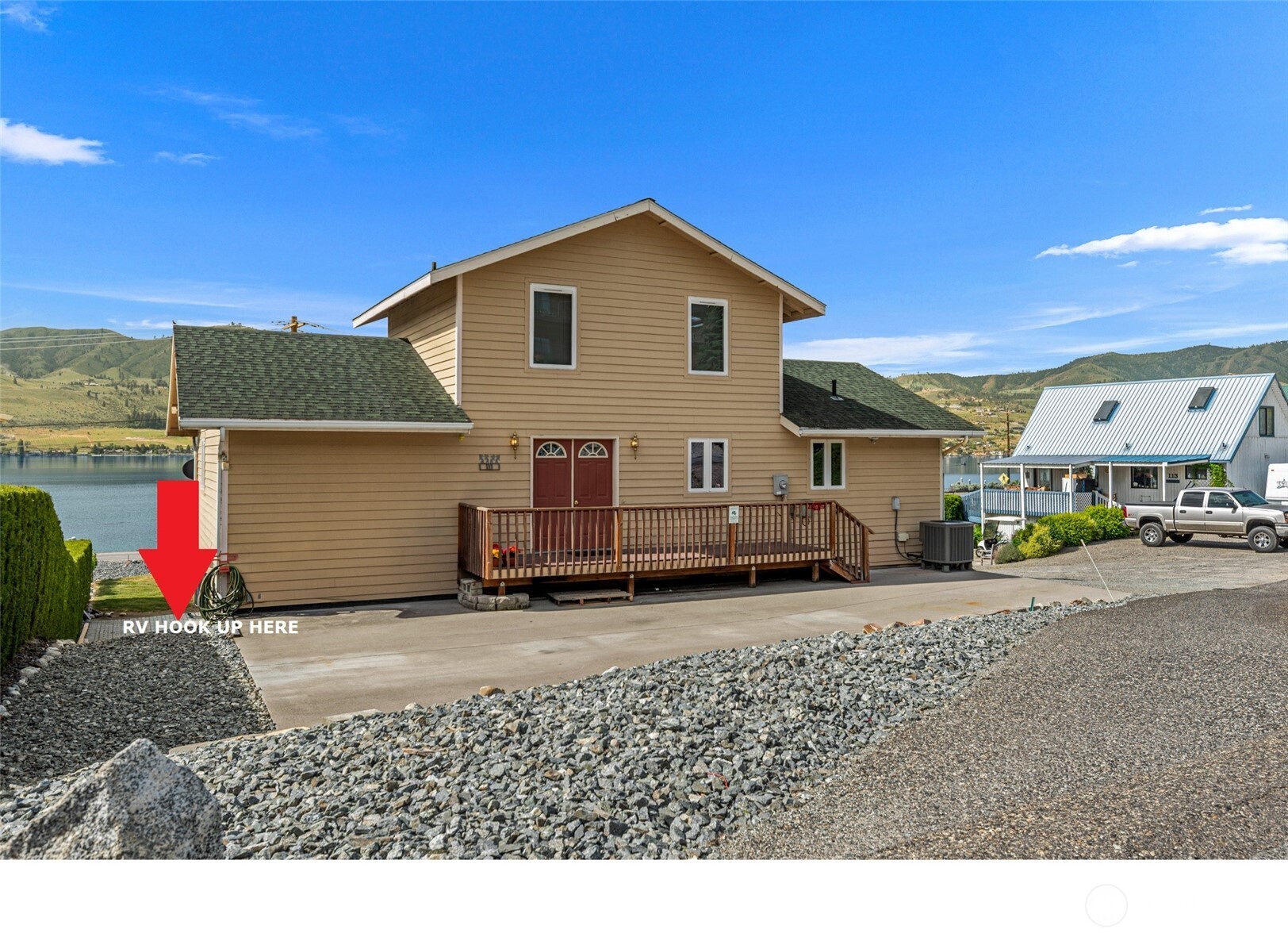 RV hook up with water, power & sewer in front of home